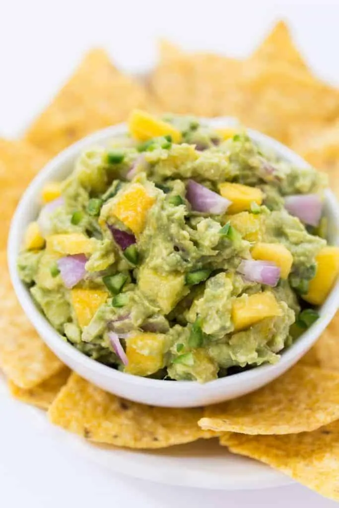 Spicy Mango Guacamole -- made with less than 10 ingredients, it makes the best dip, spread AND toast topper!