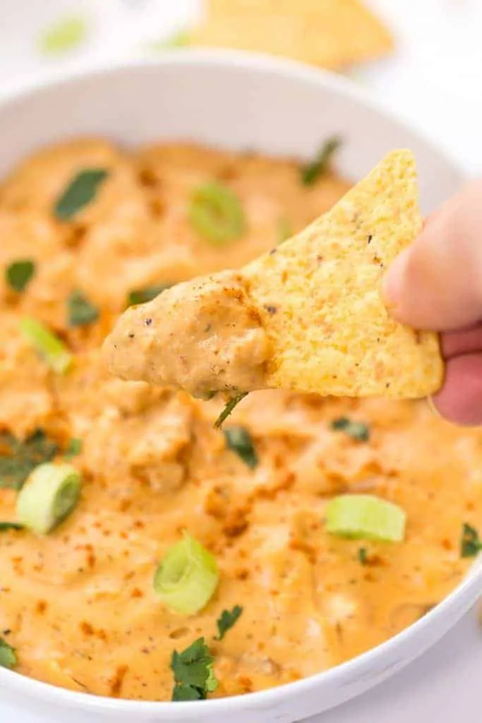 Vegan Kimchi Queso Dip -- the ultimate appetizer or snack to serve with tortilla chips & guac!