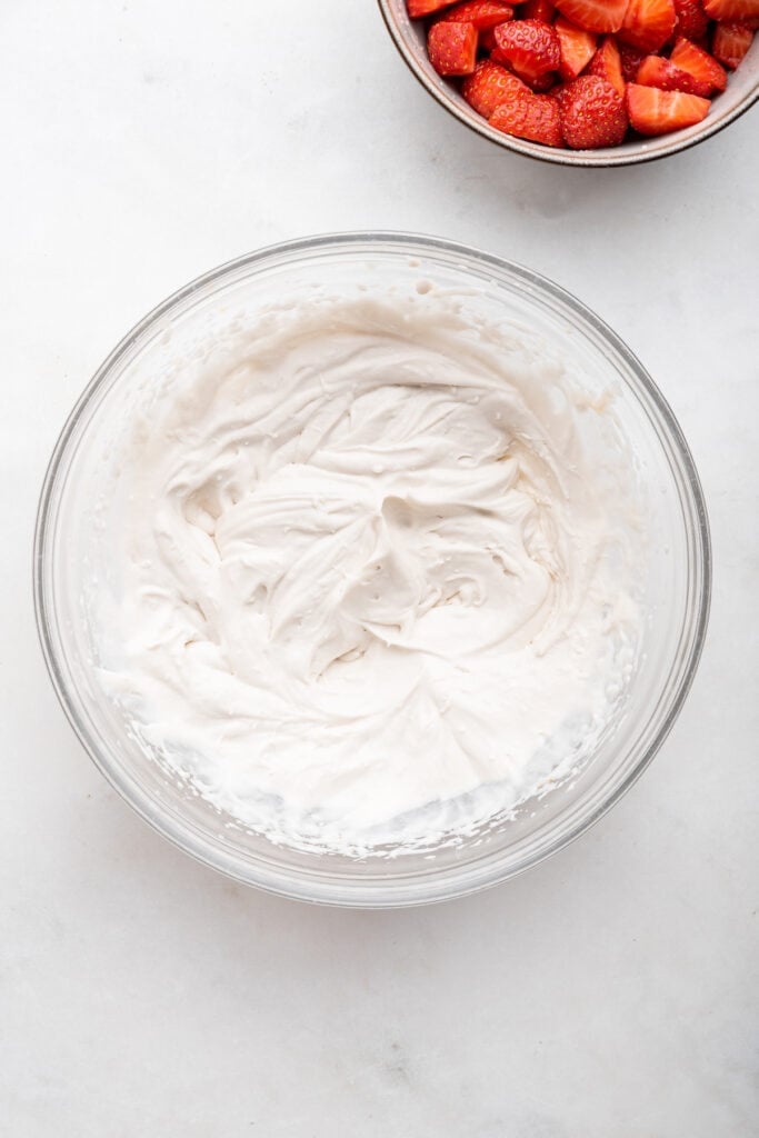 Overhead view of whipped cream in bowl
