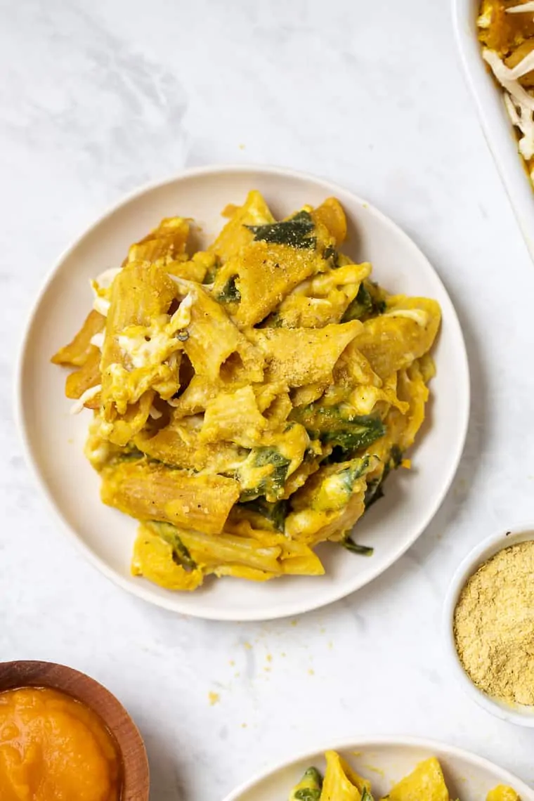 Overhead view of pumpkin pasta served on a plate.