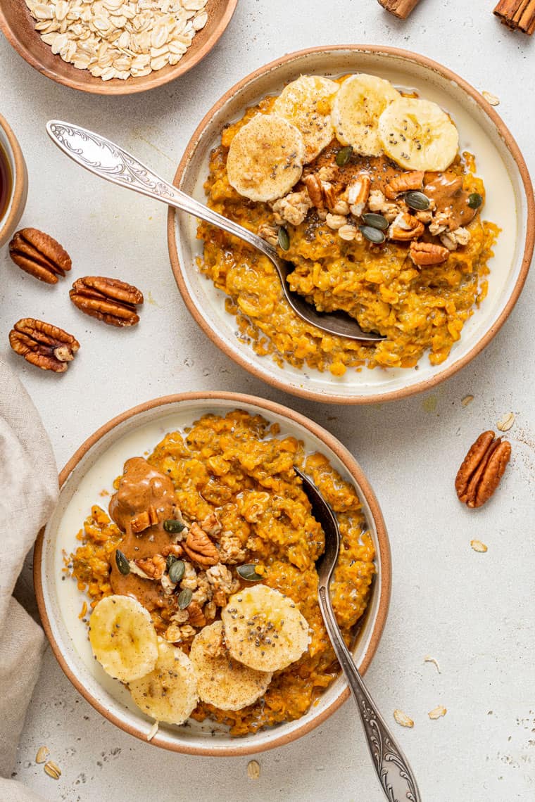 bowls of pumpki noats with banana and nuts