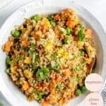 white bowl with quinoa fried rice and vegetables