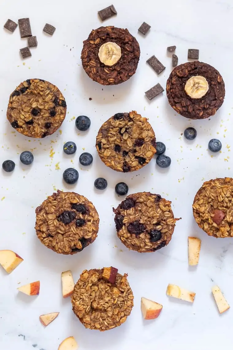overhead of 4 flavors of baked oatmeal cups that are vegan and gluten-free
