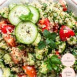 close up on quinoa tabbouleh salad with tomatoes and cucumbers