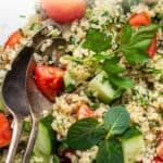 close up on quinoa tabbouleh salad with tomatoes and cucumbers