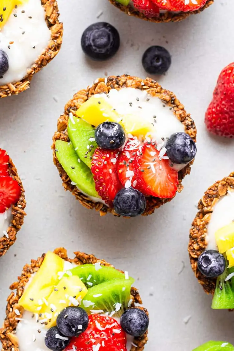 close up on an oatmeal cup with vegan yogurt and fresh berries