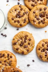 baked almond butter cookies with chocolate chips and flaky salt on top