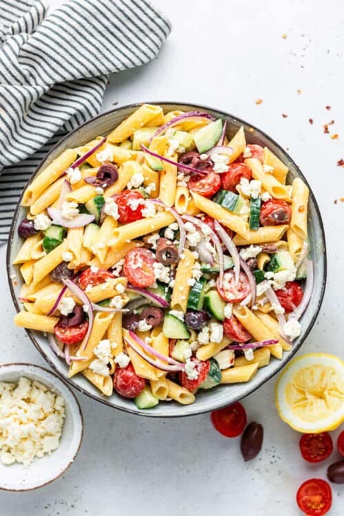 overhead of a bowl of colorful vegetarian pasta salad