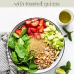 Strawberry Spinach Salad with Toasted Quinoa text overlay