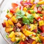 Overhead view of peach salsa in bowl