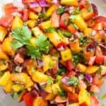 Overhead view of peach salsa in bowl