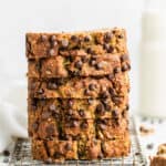 A stack of slices of chocolate chip zucchini bread.