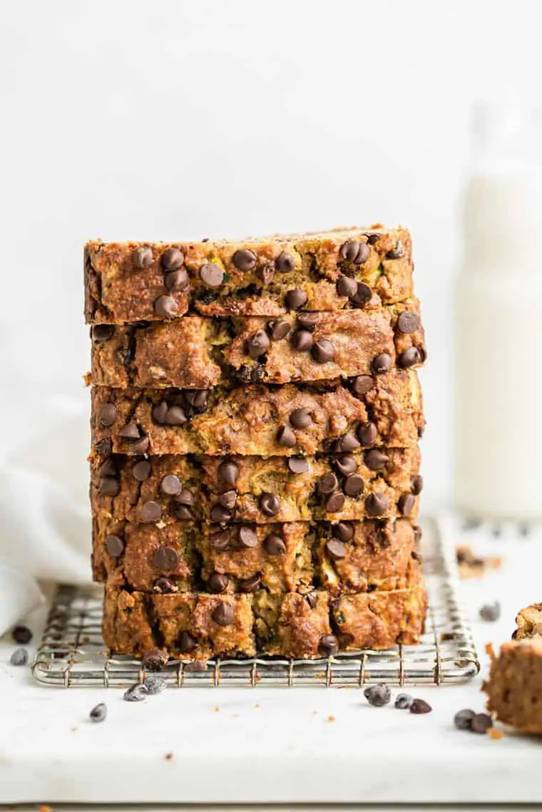 slcies of chocolate chip zucchini bread on a wire rack