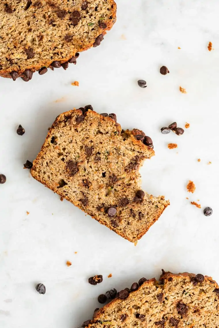 slices of zucchini bread with a bite removed