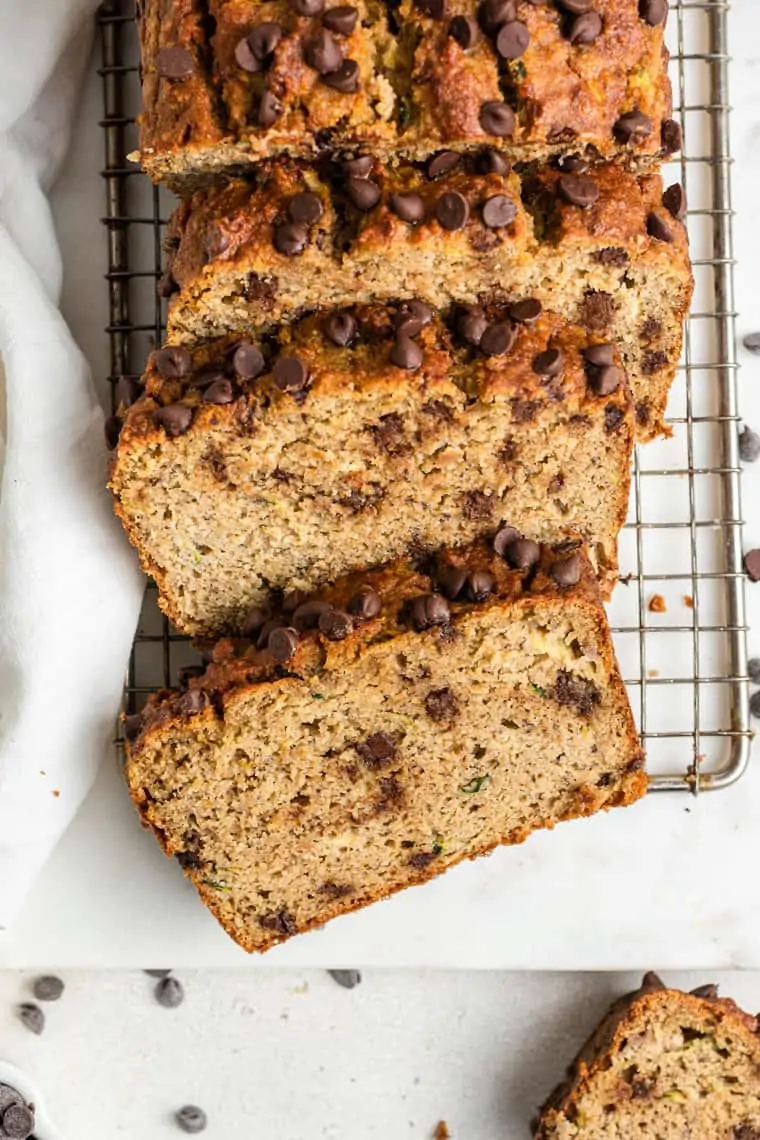 Overhead image of a sliced chocolate chip zucchini loaf.