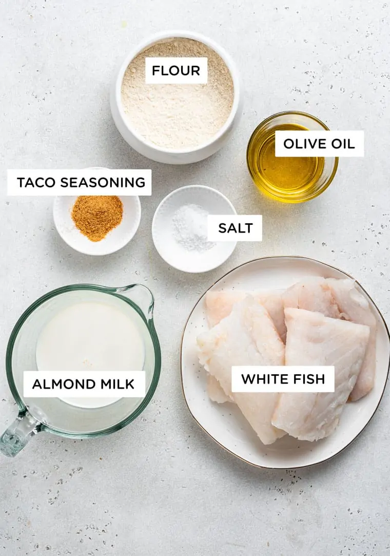 ingredients for fish tacos with white fish, almond milk and flour