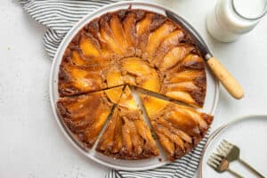 slices of upside-down apple cake on a serving platter