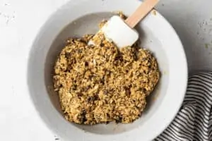 mixing bowl with ingredients for peanut butter energy bites