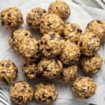 peanut butter energy balls on a piece of parchment paper