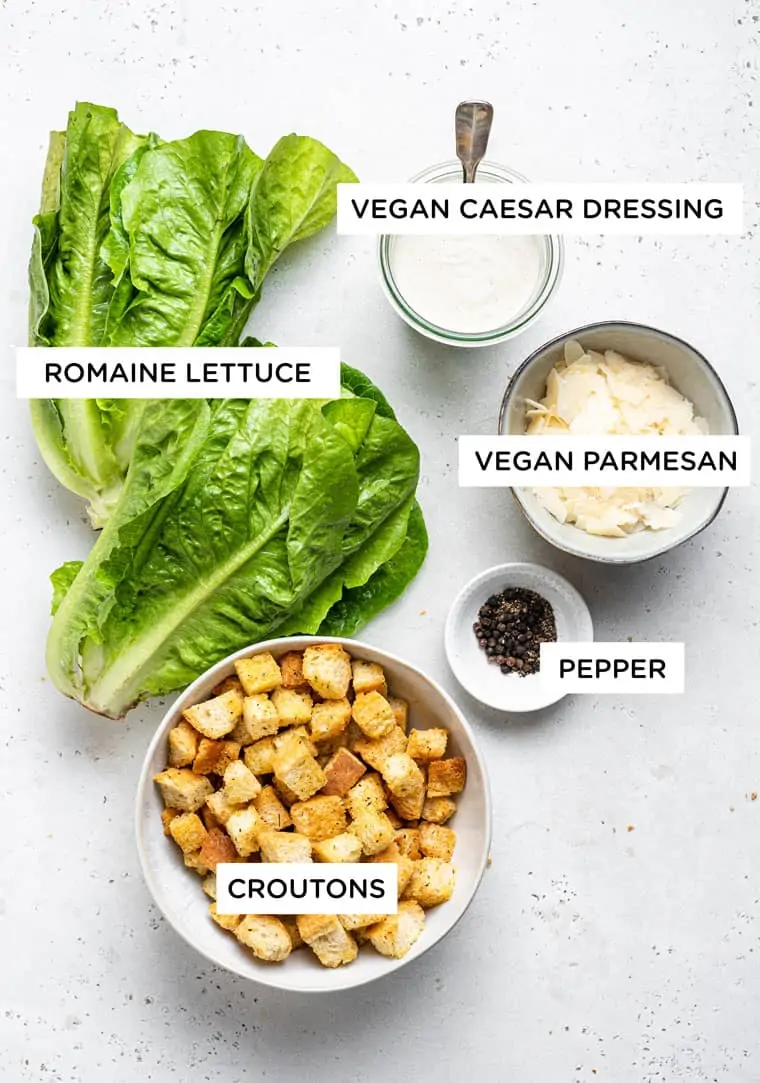 ingredients for vegan caesar dressing with romaine and croutons