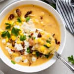 close up on a bowl of corn chowder with fresh corn and cashew cream