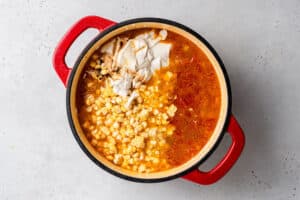 overhead of vegan corn chowder with whole corn, cashew cream and spices