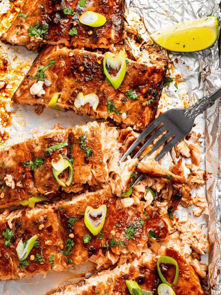 Overhead view of fork flaking firecracker salmon