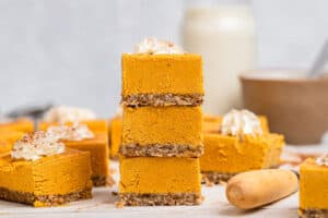 no bake pumpkin bars stacked on top of eachother