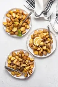 three plates of roasted potatoes