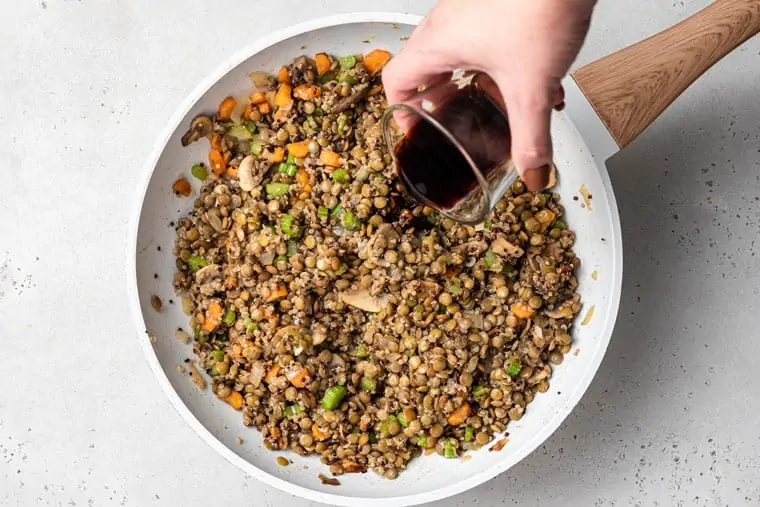 adding soy sauce to vegan shepherd's pie filling