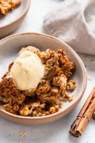 dish of pumpkin crisp with ice cream