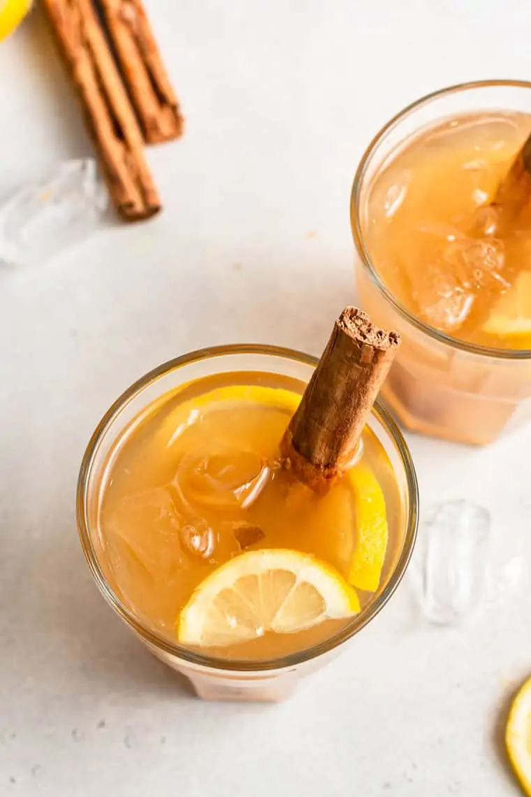 overhead of lemon bourbon cinnamon drink