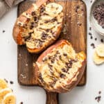 cutting board with sweet potatoes, banana and cacao nibs