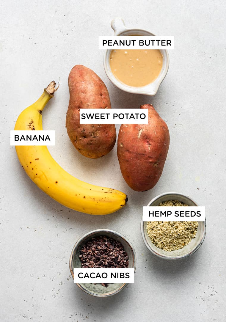 ingredients for stuffed sweet potatoes wiht banana peanut butter, cacao and hemp