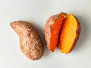 slicing baked sweet potatoes