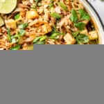 skillet with tofu pad thai and limes