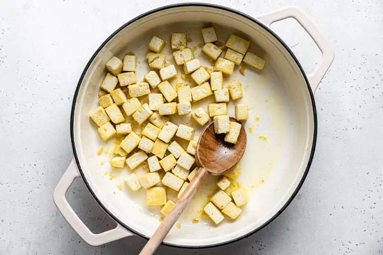 cooking tofu in a pot