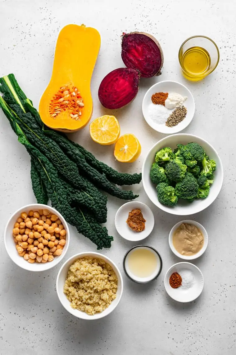 ingredients for bowls with broccoli, kale, squash, beets, lemon and chickpeas