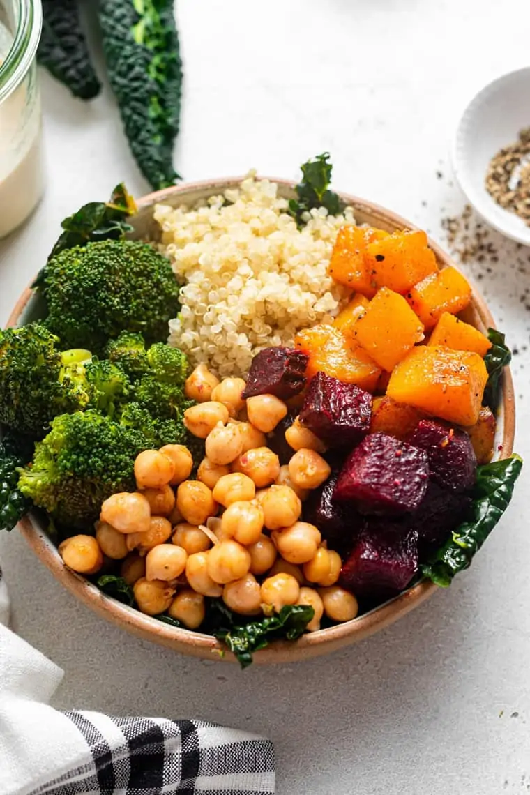 winter quinoa bowl with broccoli, squash and beet