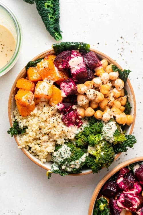 winter quinoa and vegetable bowl with dressing