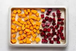 baking sheet with roasted squash and beets