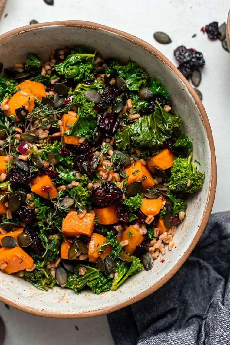 bowl of farro salad with kale and greens