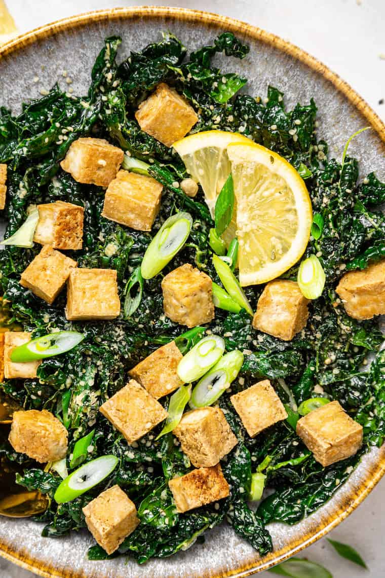 bowl of kale salad with crispy tofu