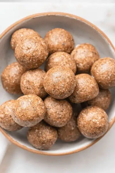 bowl of energy bites with cashews and dates