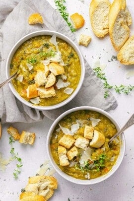 two bowls of vegetarian split pea soup with toasted bread.
