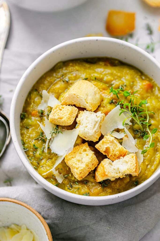 bowl of split pea soup with croutons