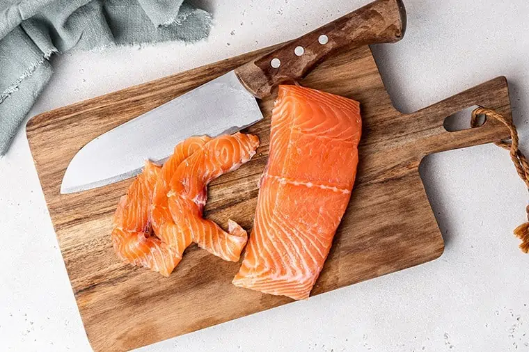 slicing cured salmon
