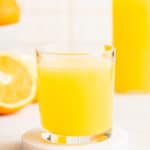 glass of yellow lemon adrenal cocktail