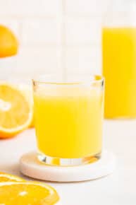 glass of yellow lemon adrenal cocktail