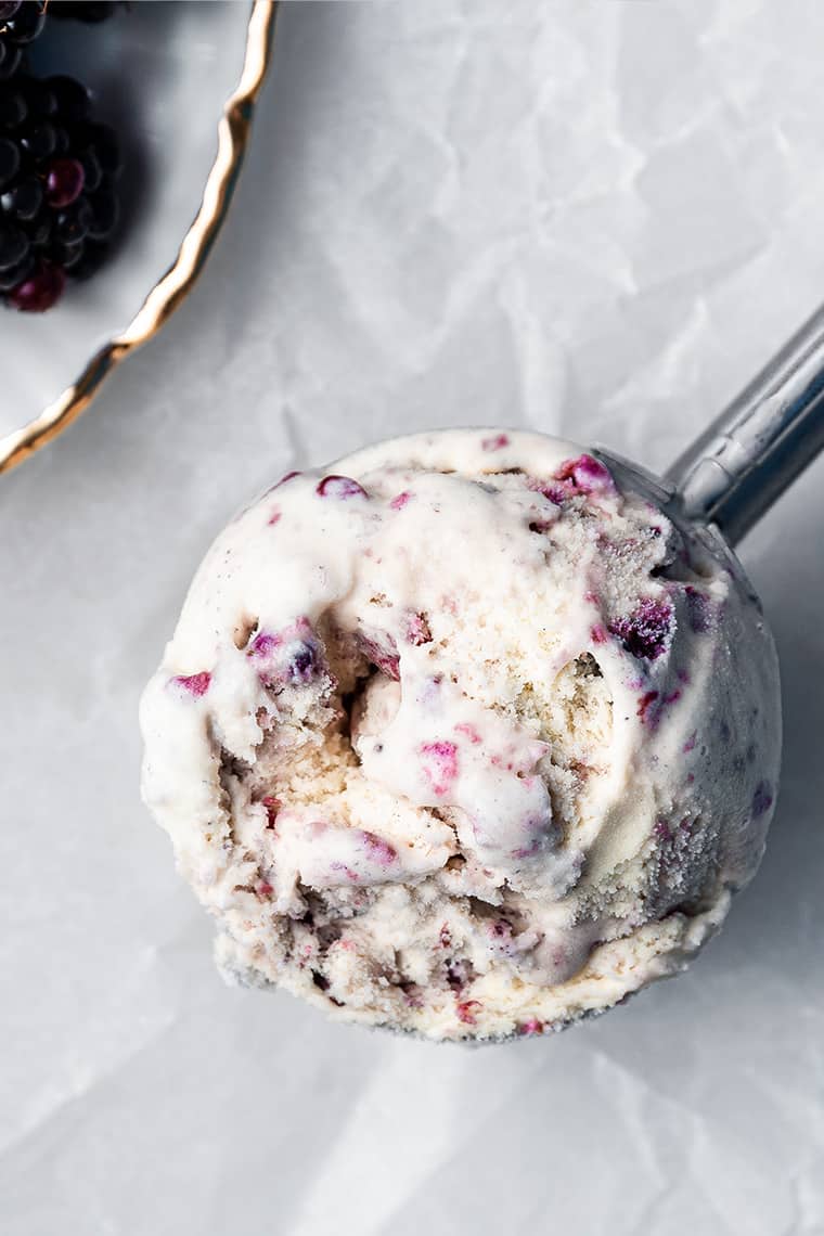 Closeup of black raspberry ice cream scoop